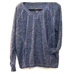 Yoga top with hoodie type front pocket